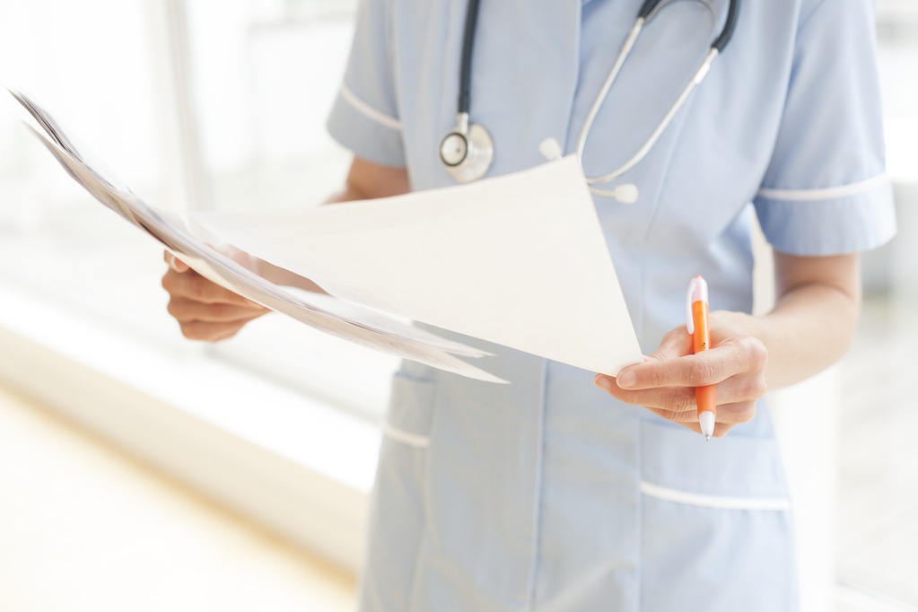 Nurse with paperwork